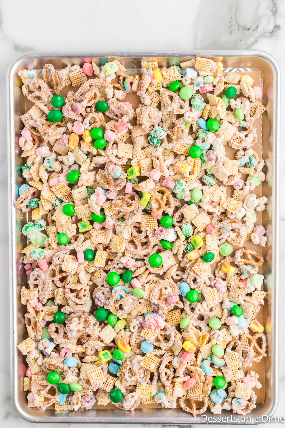Cereal mixture on baking sheet.