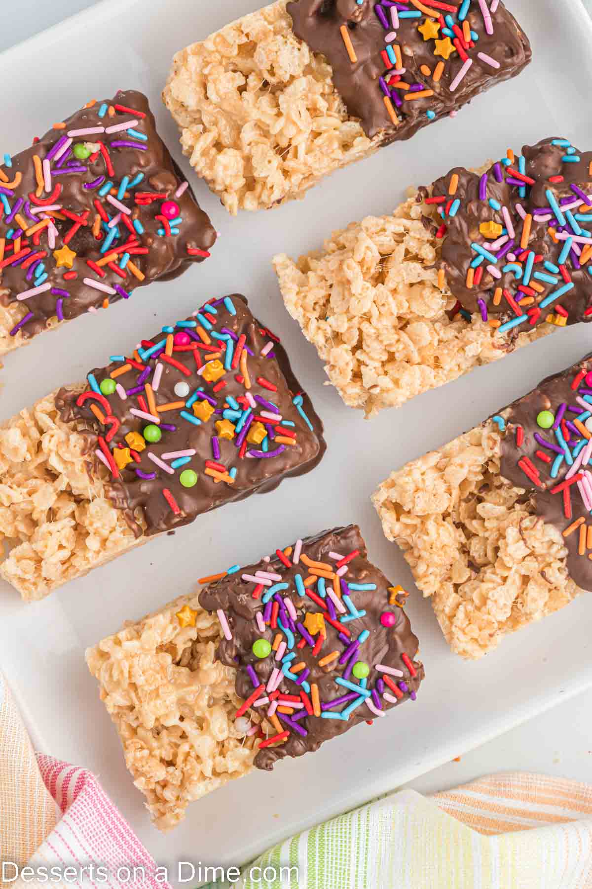 Chocolate dipped rice krispie treats ready to serve. 