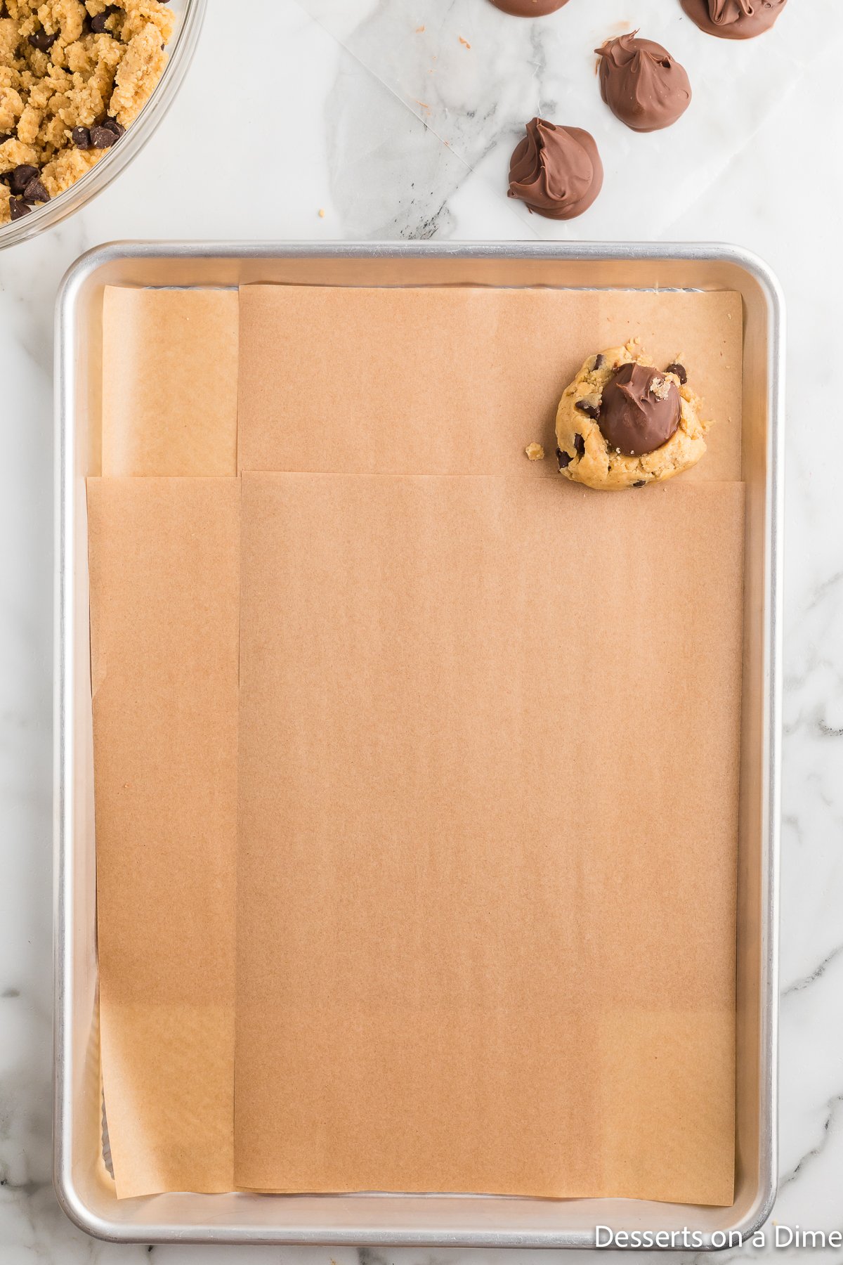 Frozen nutella placed on dough. 