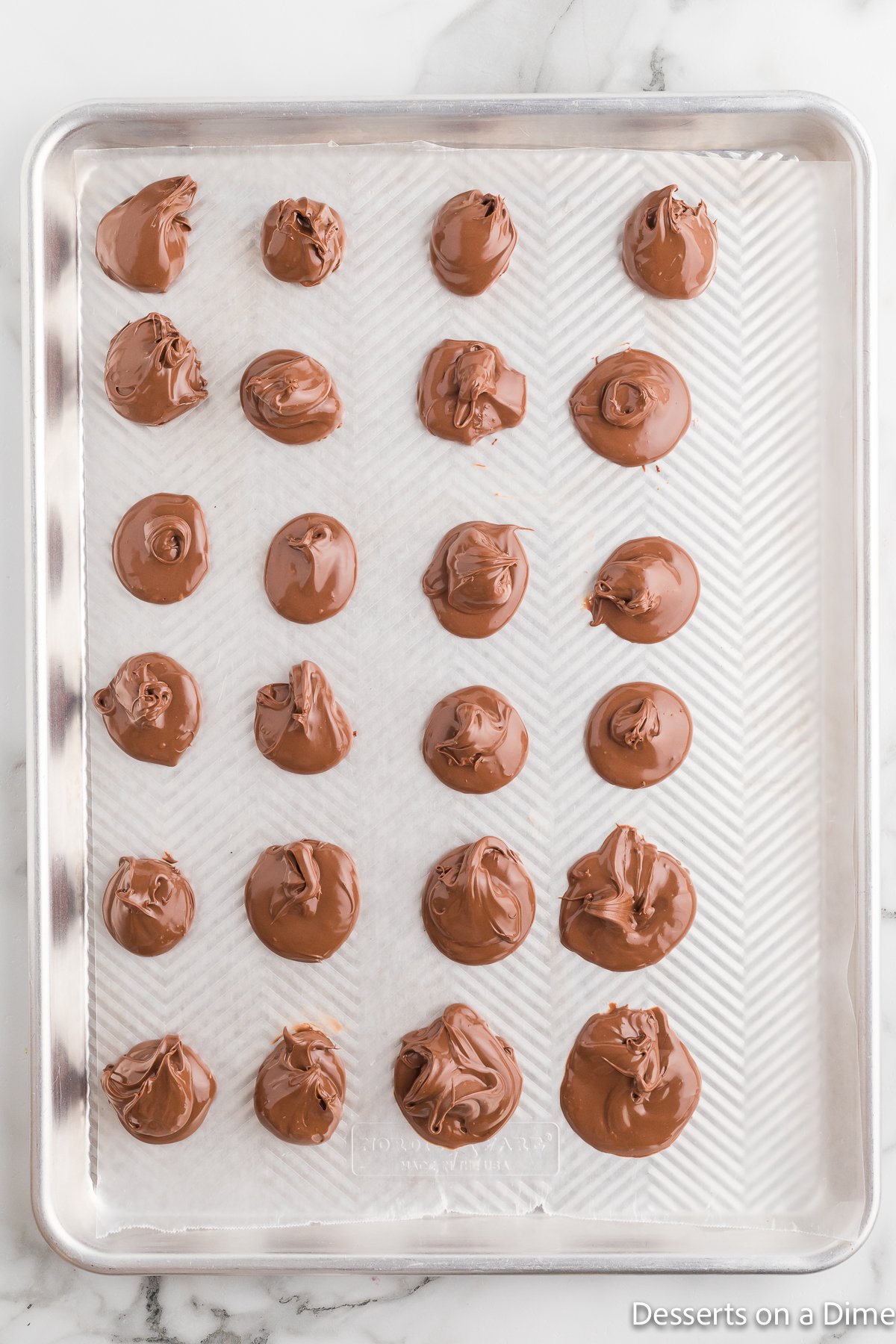 Drops of nutella ready to freeze. 