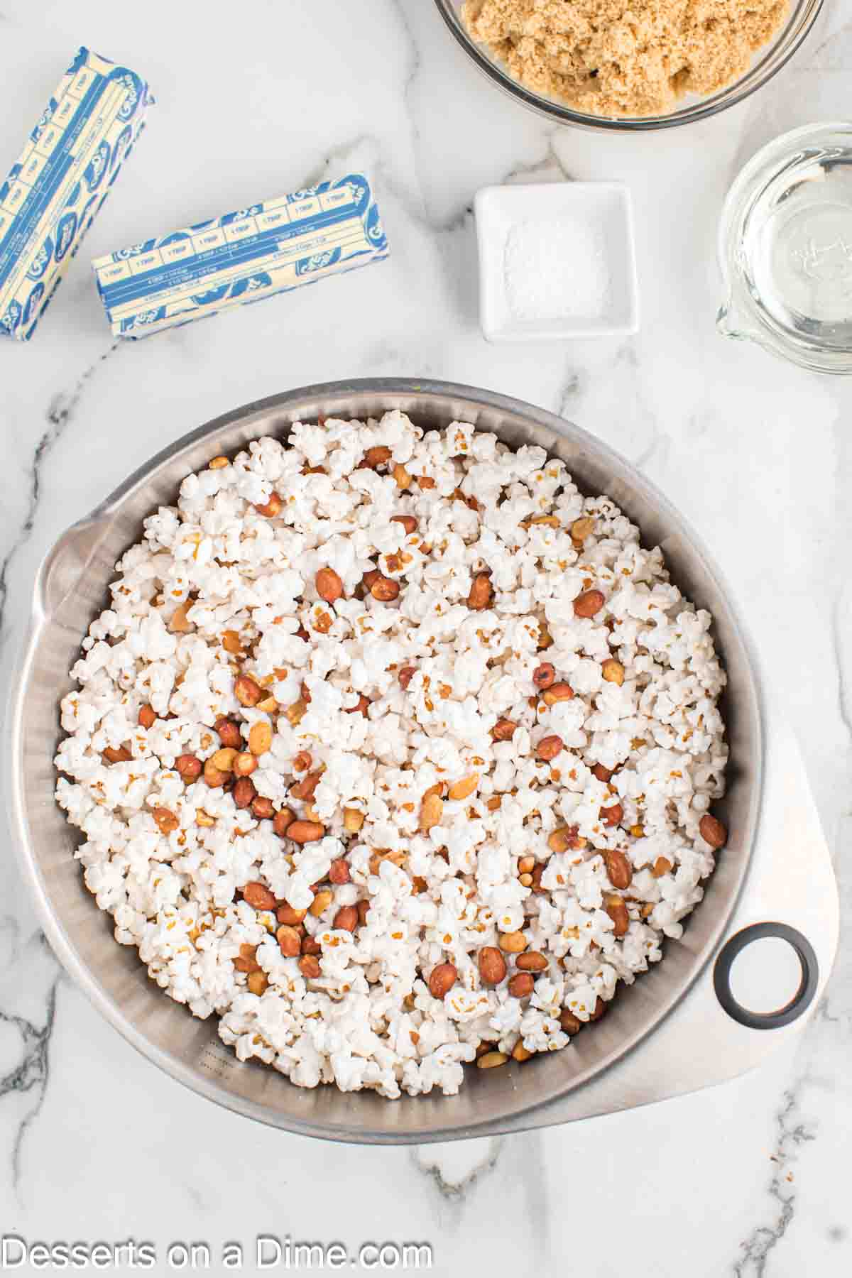 Popcorn in a bowl with peanuts.
