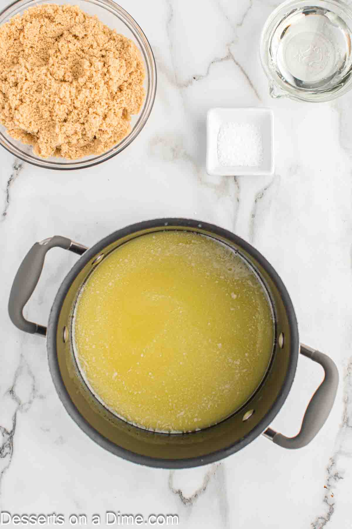 Melted butter and sugar in a saucepan.