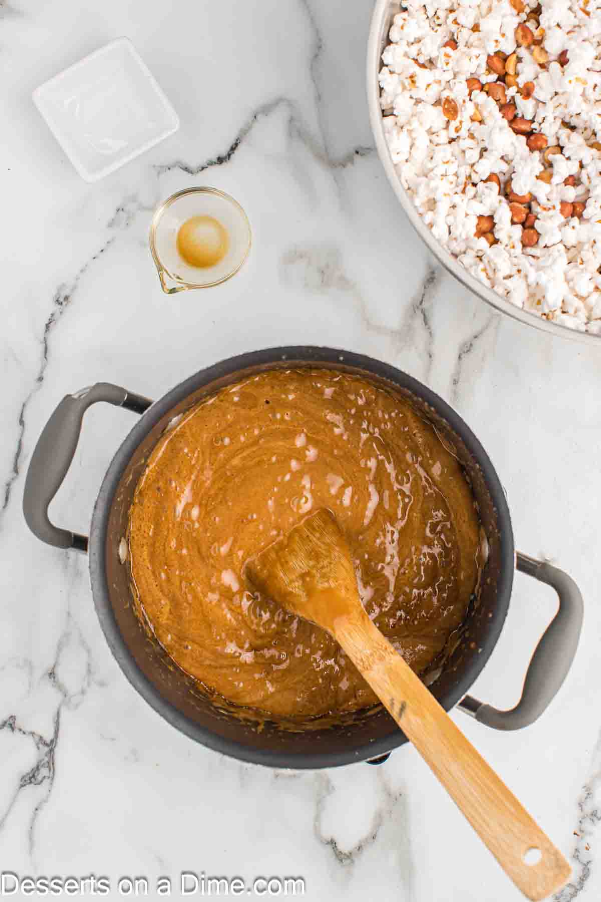 Mixture boiling and being stirred.