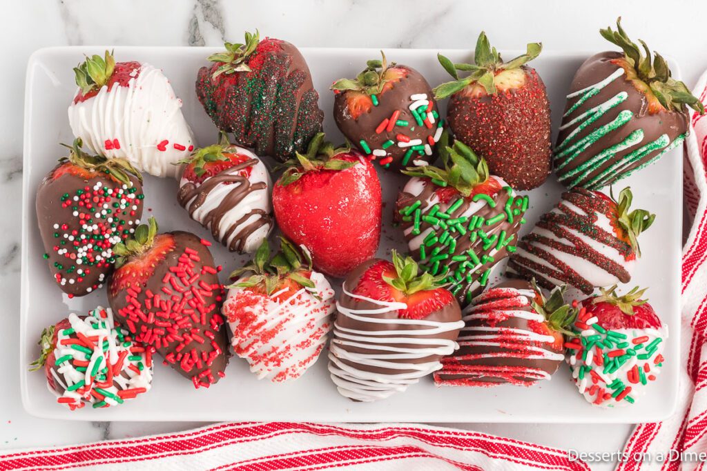 Christmas Chocolate Covered Strawberries on a white platter. 