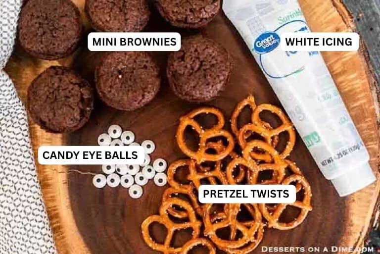 Ingredients to make recipe: Mini Brownies, Pretzels, Frosting and Candy Eyes.