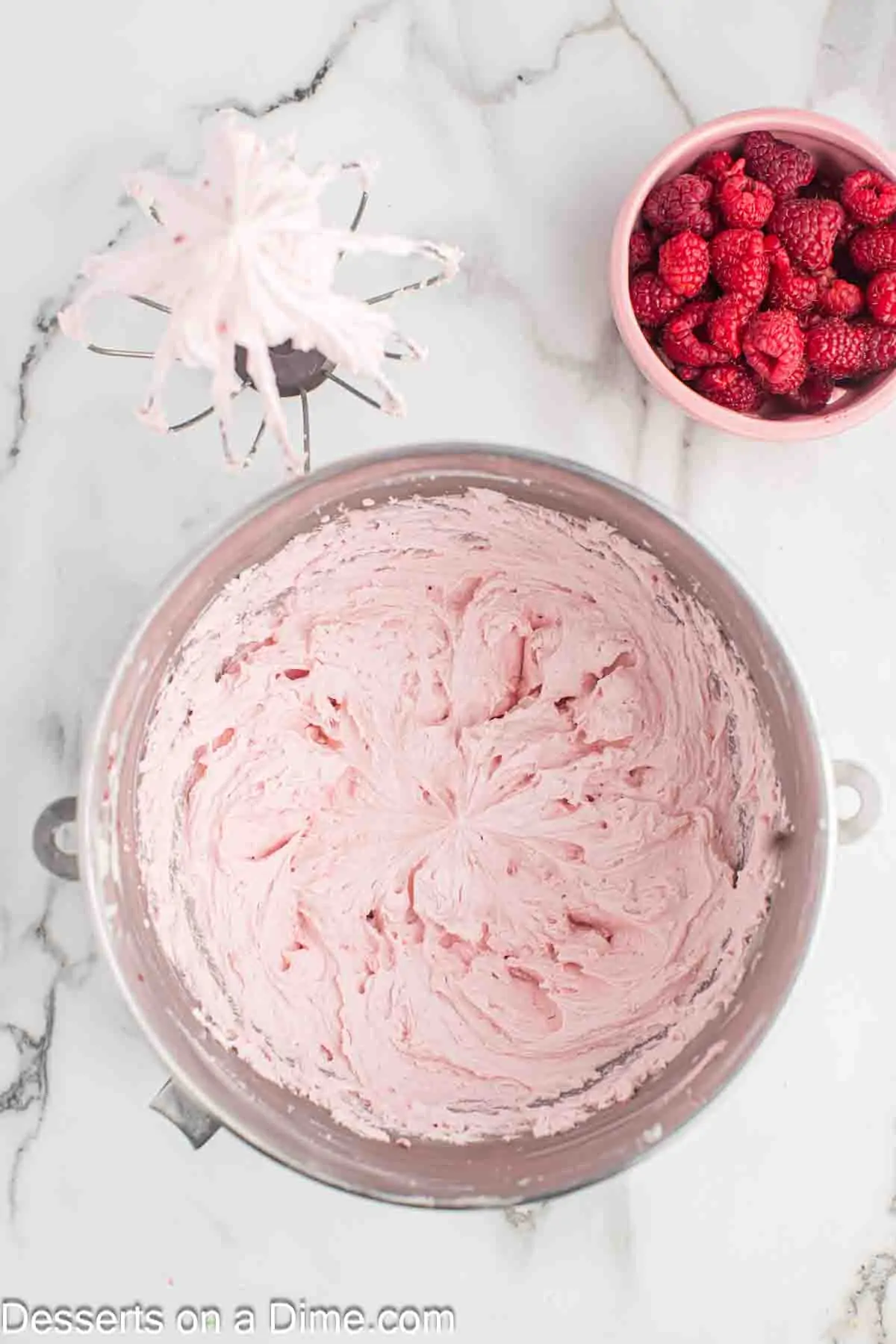 Raspberry puree in bowl.