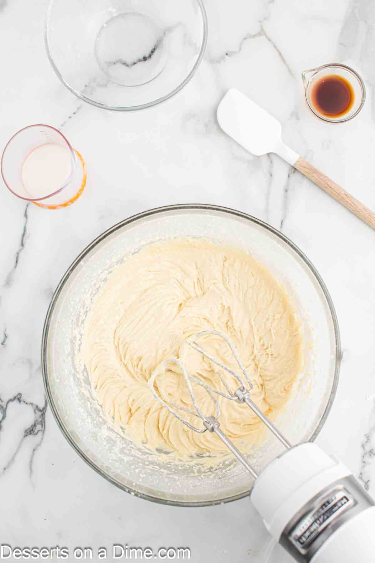 Flour and milk added to bowl. 