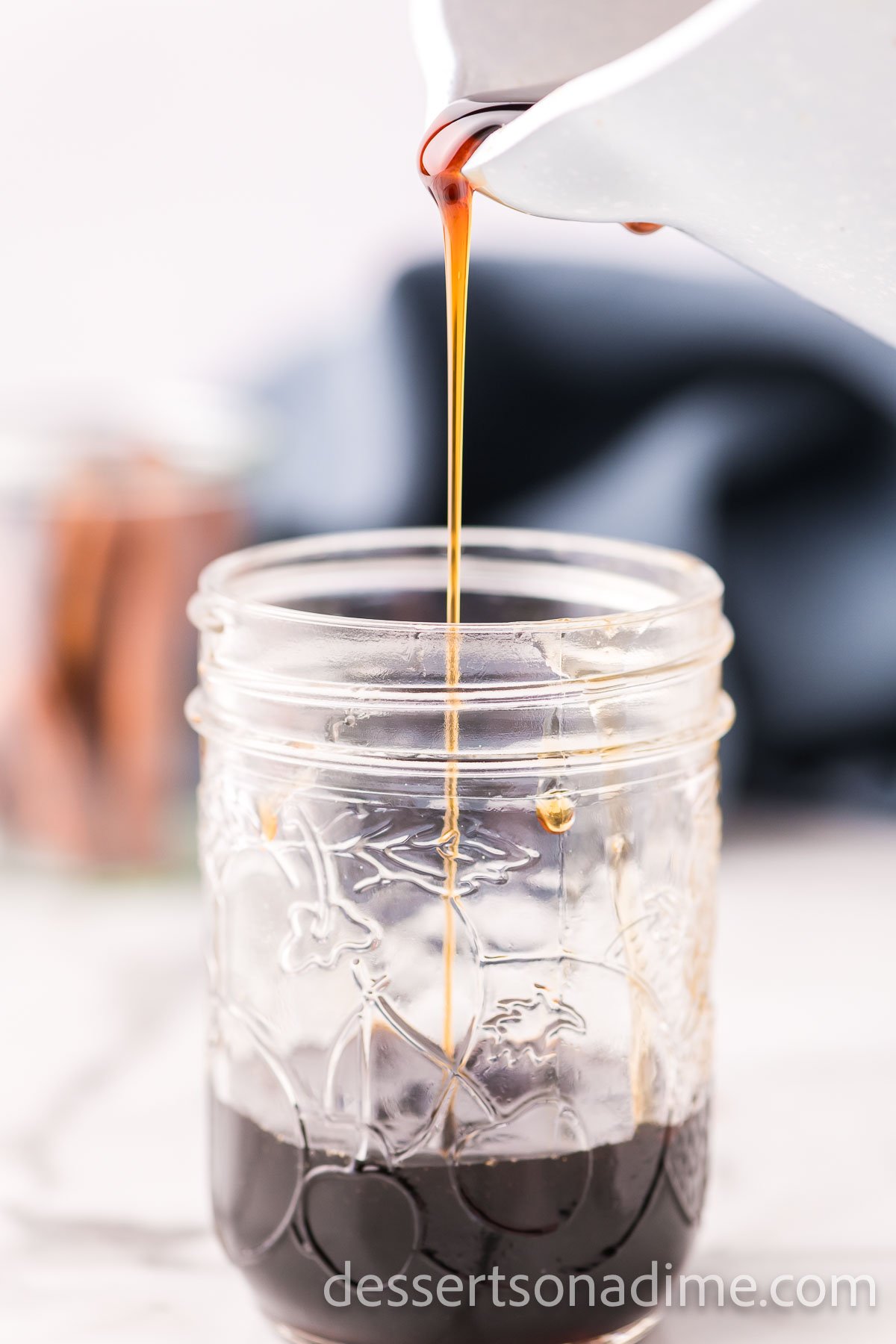 Brown sugar syrup in jar.