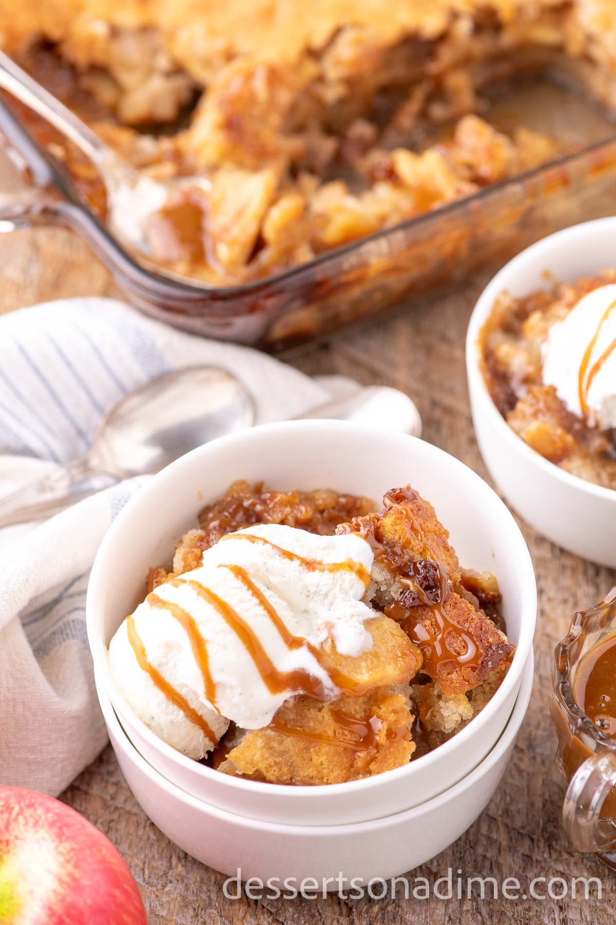 Bowl of cobbler with ice cream.