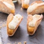 Pumpkin PIe Tacos ready to serve and topped with whipped cream.