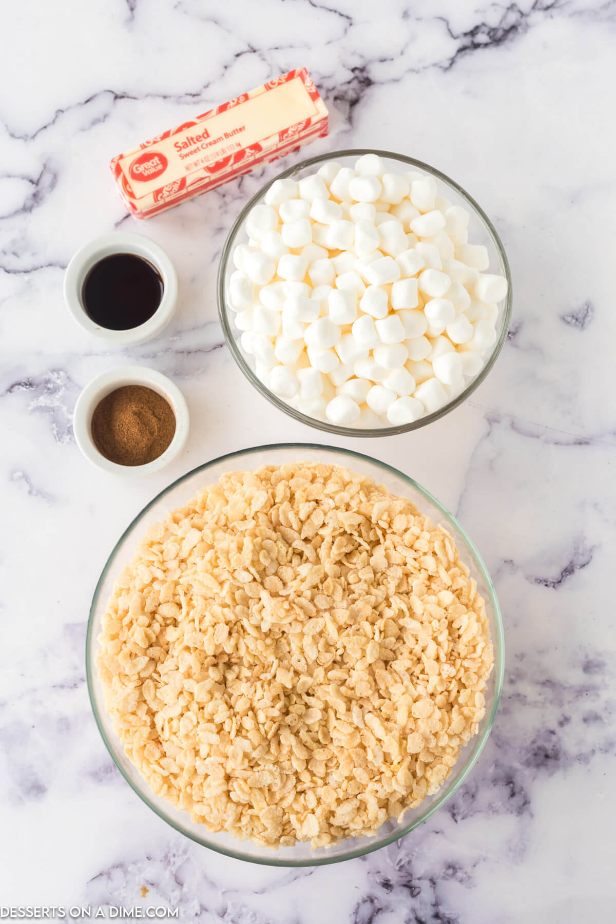 Ingredients for Snickerdoodle Rice Krispy Treats - butter, mini marshmallows, vanilla, rice cereal, cinnamon. 