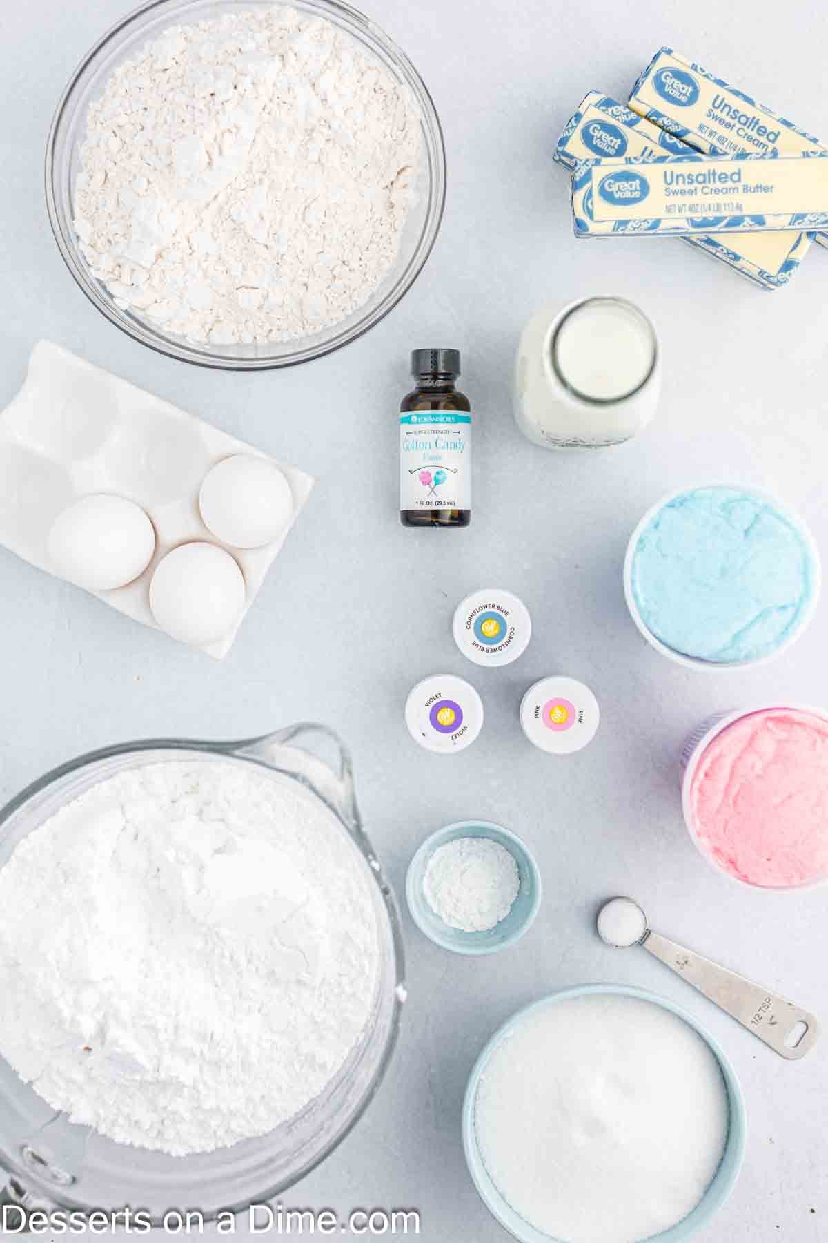 Cotton Candy Cake ingredients - flour, butter, sugar, large eggs, cotton candy flavoring, milk, gel food coloring, powdered sugar, milk. 