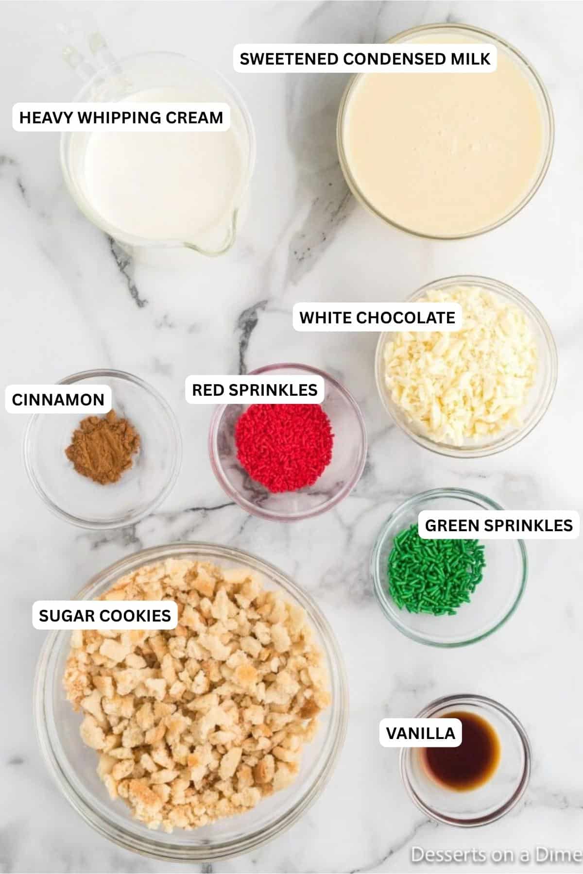 Ingredients for recipe: heavy whipping cream, sweetened condensed milk, vanilla, ground cinnamon, sugar cookies, white chocolate and sprinkles. 