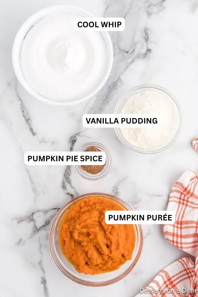 Ingredients for recipe: pumpkin puree, pudding mix, pumpkin pie spice and whipped cream. 