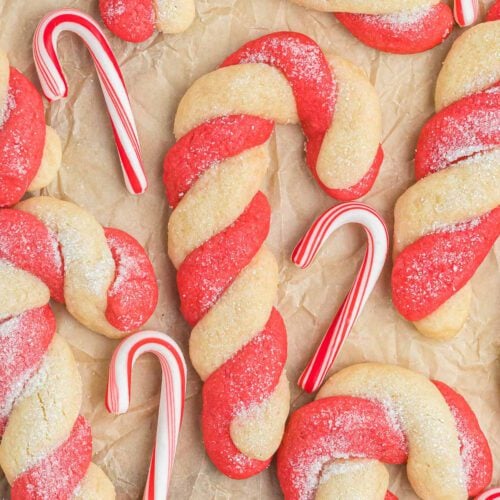 Candy cane cookies arranged together.