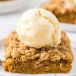 Pumpkin crisp topped with a scoop of vanilla ice cream