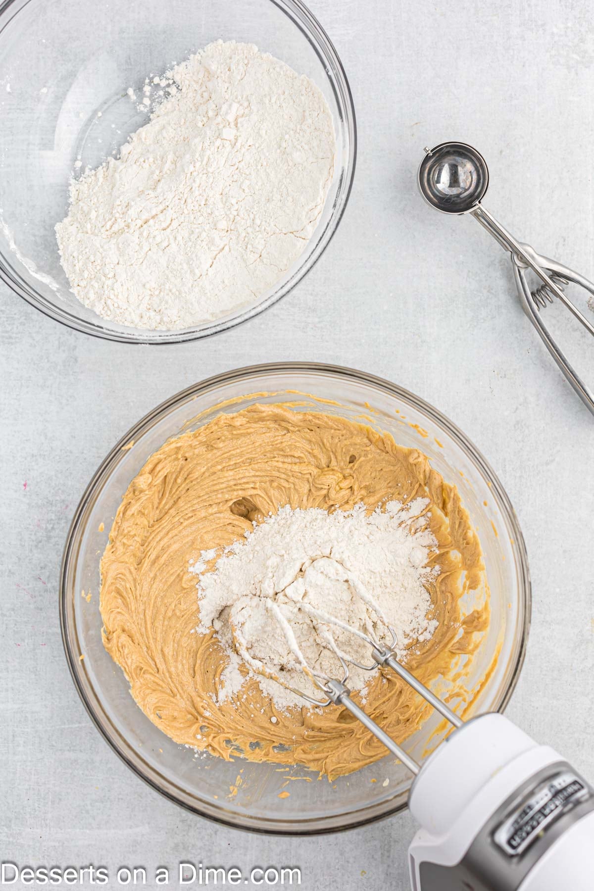 Dry ingredients gradually added to wet ingredients. 