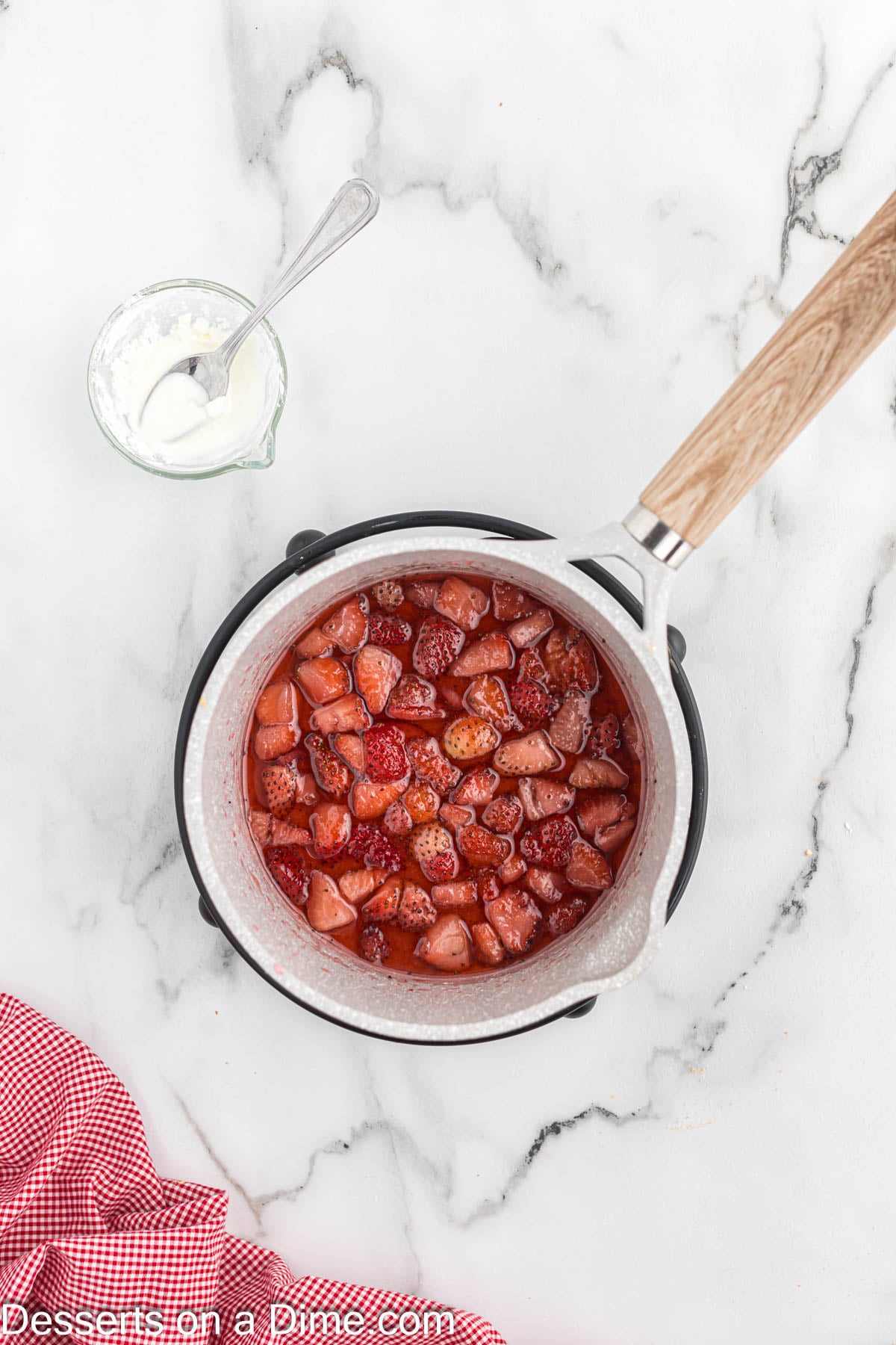 Strawberries in saucepan. 