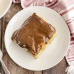 Boston eclair cake on a white plate.