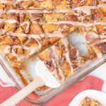 Cinnamon roll bread pudding being served.