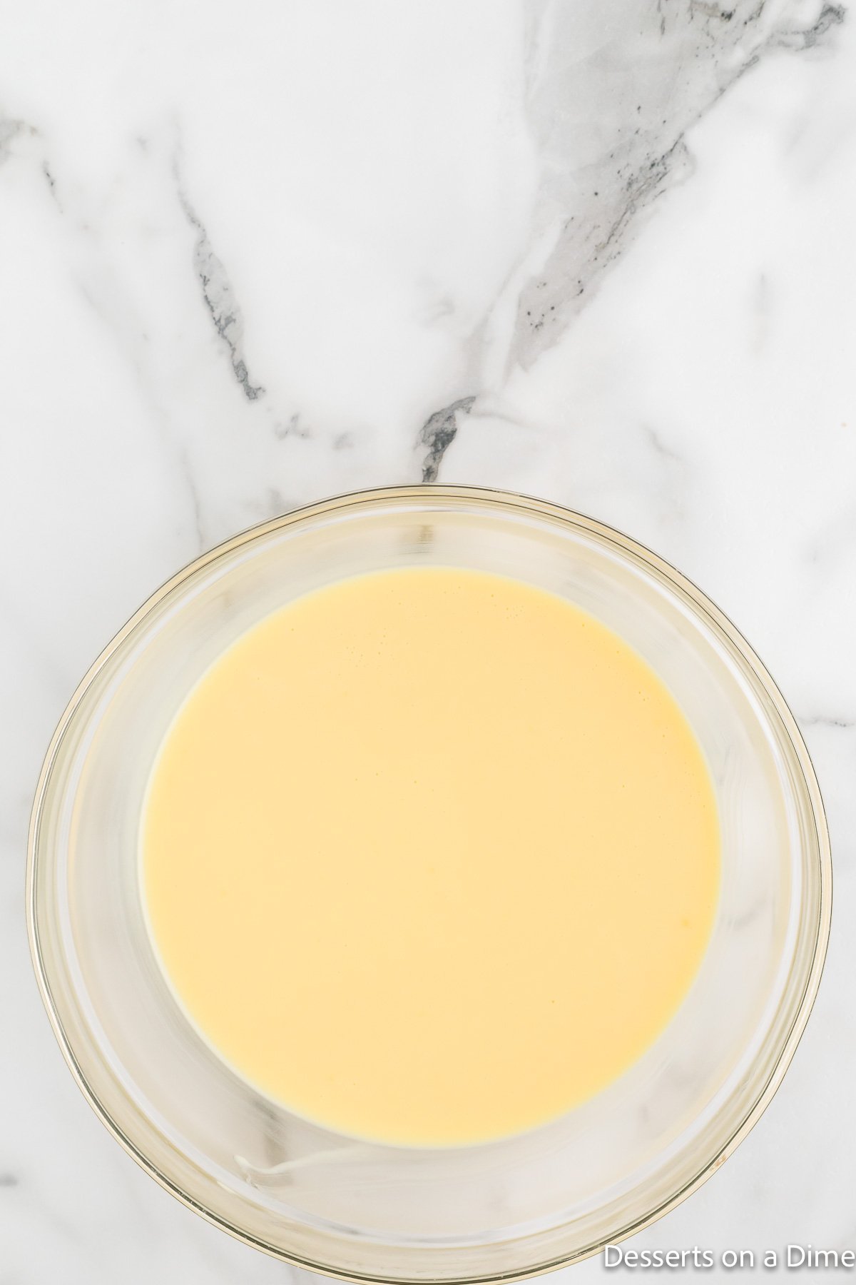 Glass bowl of pudding.