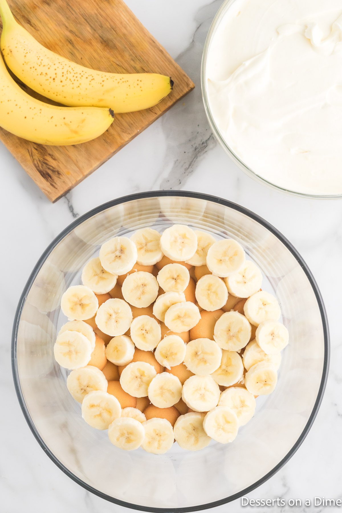 Sliced bananas on top of the wafers.