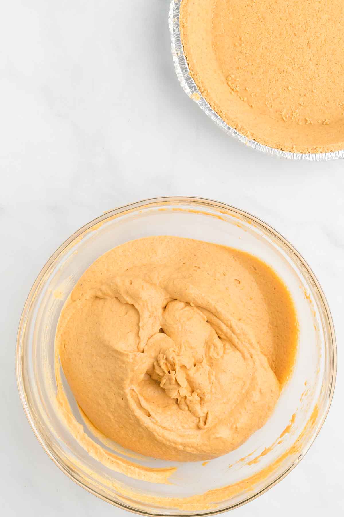 Pumpkin mixture combined in a bowl. 