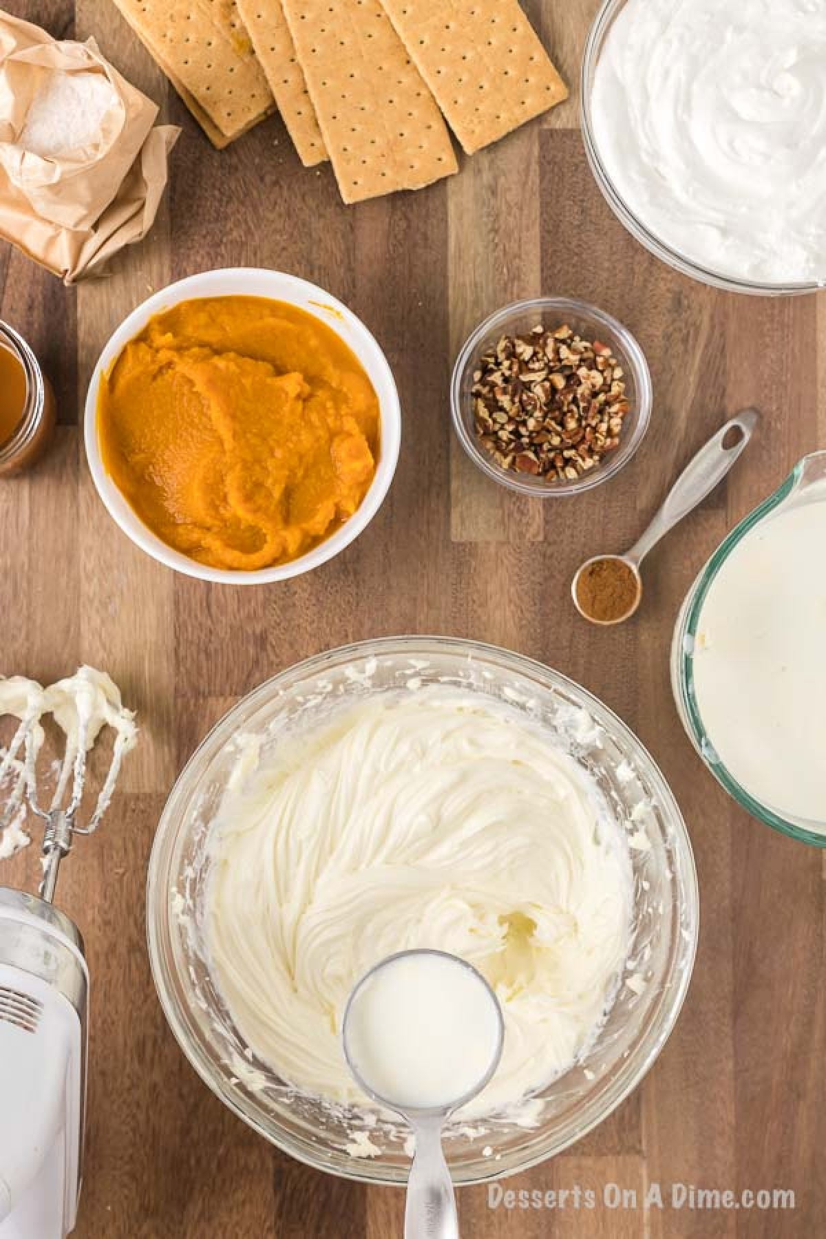 The milk being added to the cream cheese mixture.  