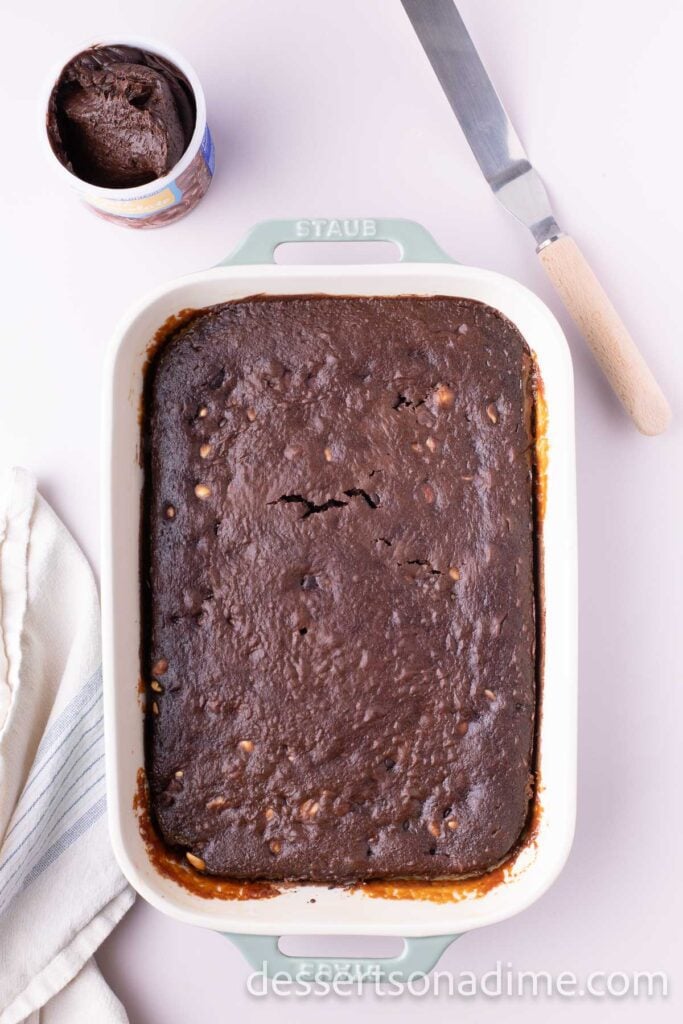 Remaining cake batter spread on cake and baked.