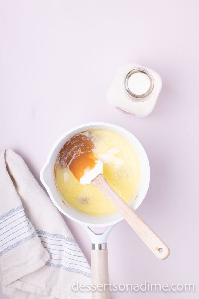 Saucepan with caramel, milk and butter combined.