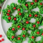 Christmas wreath cookies arranged on a platter.