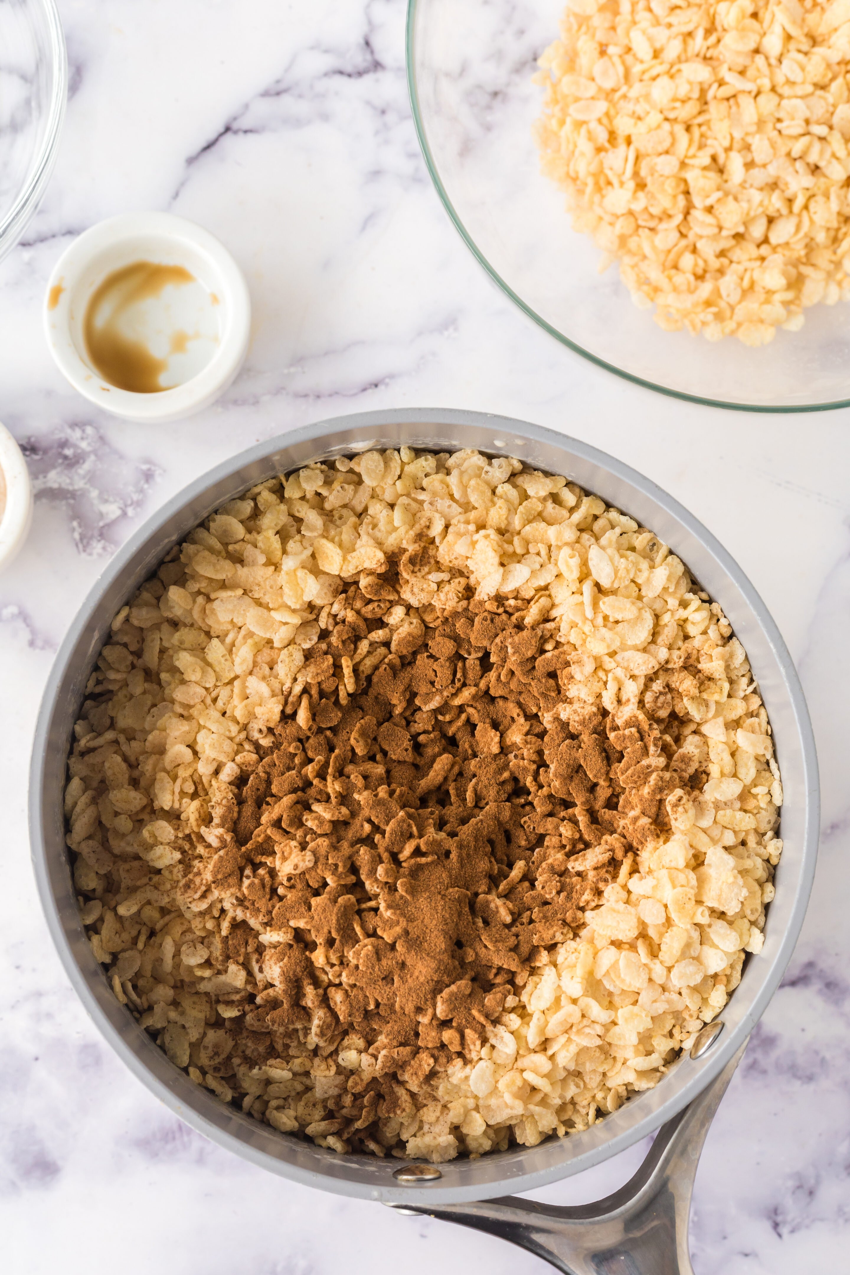 Cereal and cinnamon added to the mixture. 