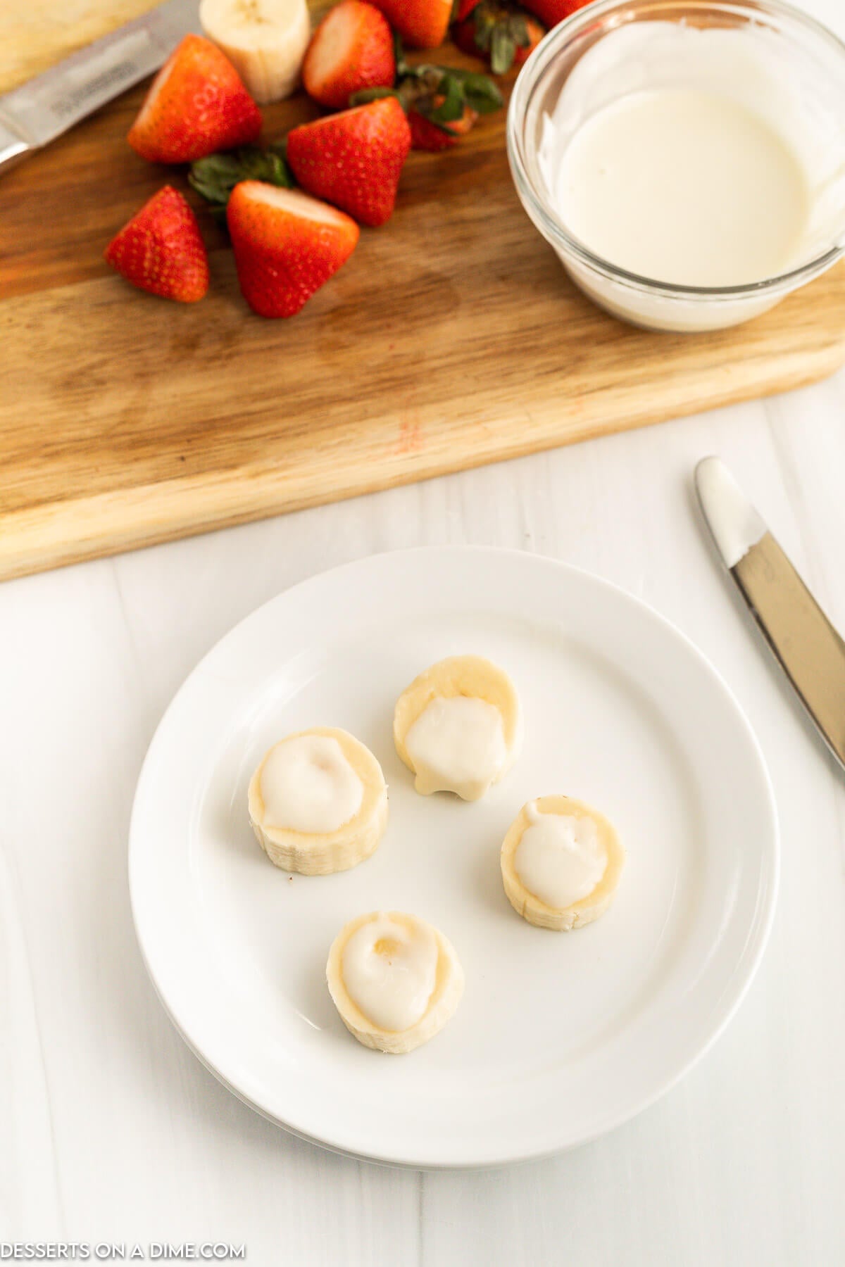 Icing spread on top of bananas. 