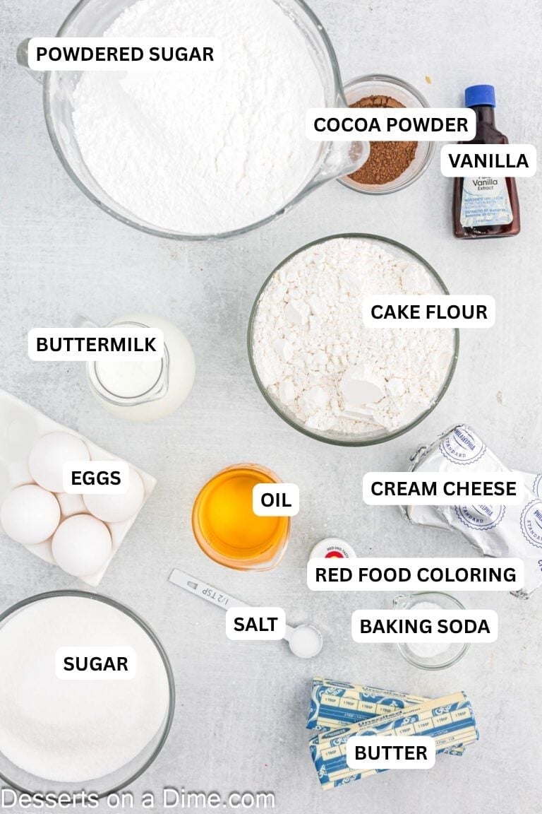 Ingredients for recipe: powdered sugar, cocoa powder, vanilla, buttermilk, cake flour, eggs, oil, cream cheese, red food coloring, salt, baking soda, sugar and butter. 