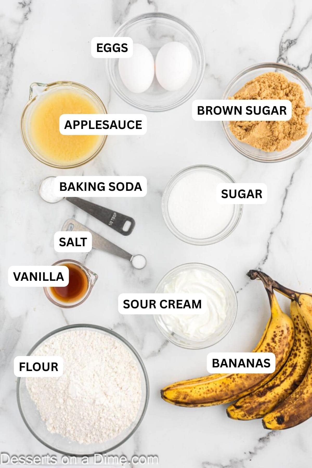 Ingredients for recipe: ripe bananas, applesauce, sour cream, sugar and flour. 