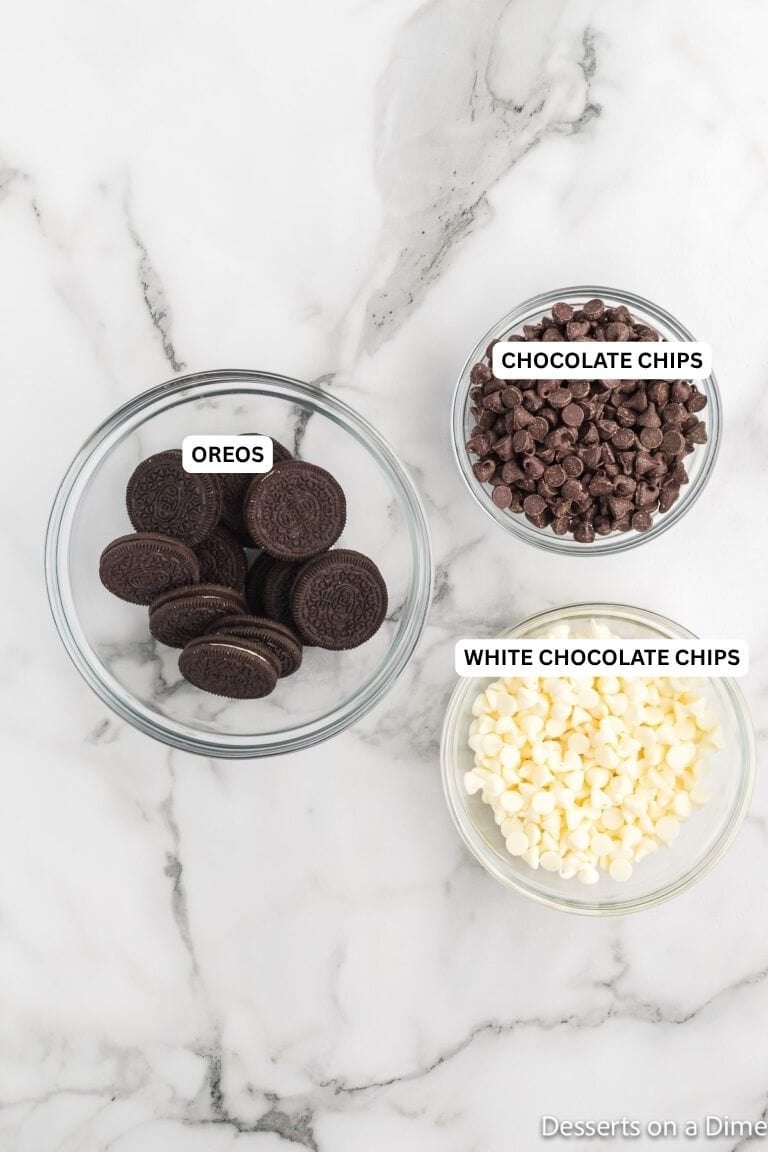 Ingredients for recipe: white chocolate chips, milk chocolate chips and Oreo cookies. 