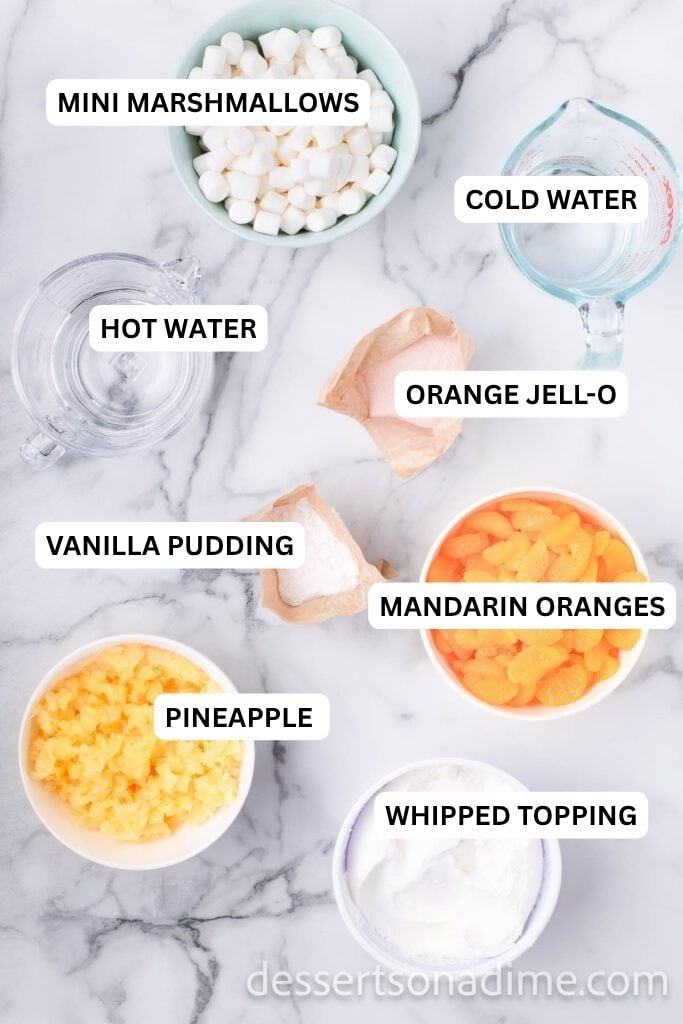 Ingredients for recipe: marshmallows, water, orange jello, vanilla pudding, mandaring oranges, pineapple and whipped topping. 