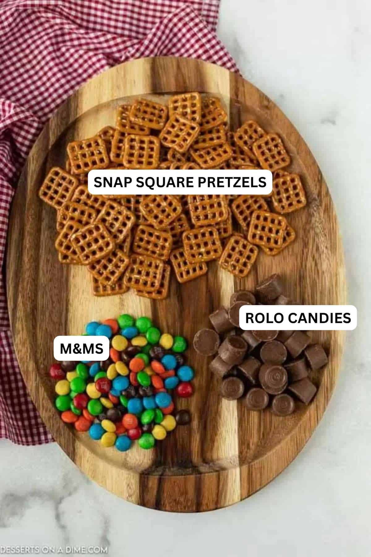 Ingredients for recipe:  pretzels, m&m's and rolo candy. 