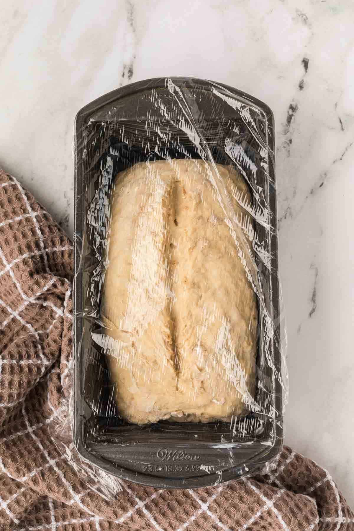 Bread covered with plastic wrap. 