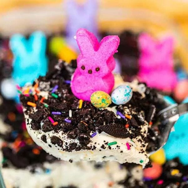 Easter dirt cake being served with a spoon.