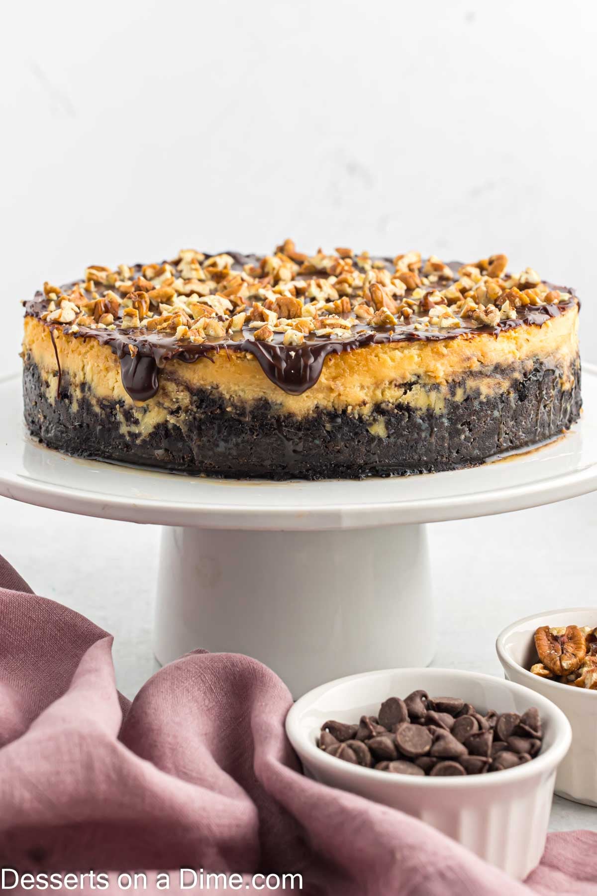 Cheesecake on serving stand. 