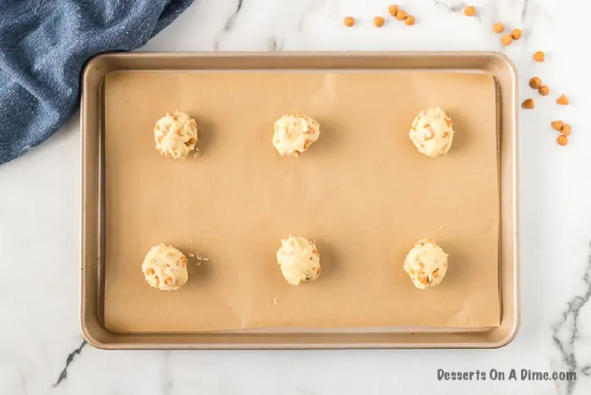Dropping cookie dough on the baking sheet
