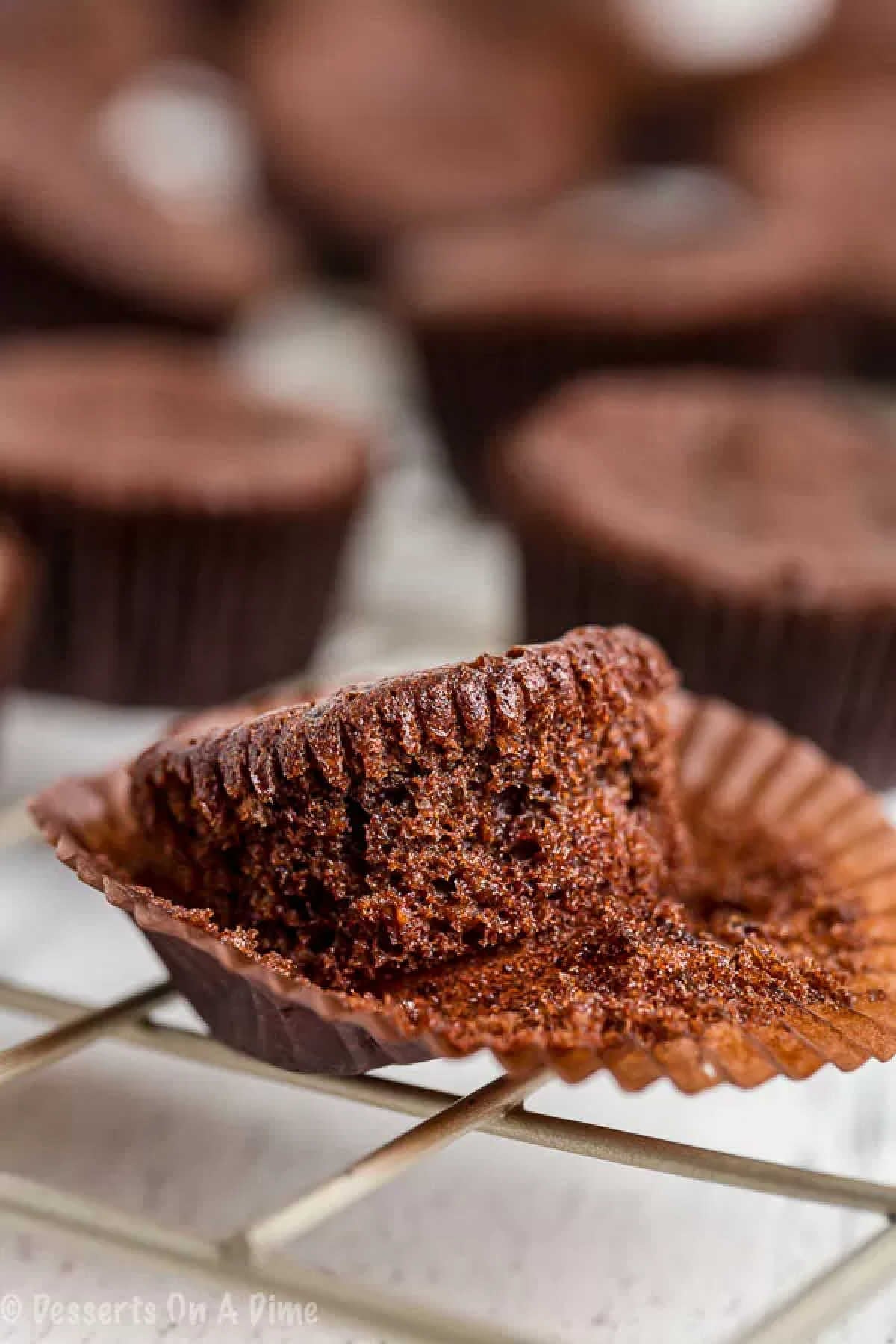 Close up image of keto brownie bites on a cooling rack. 