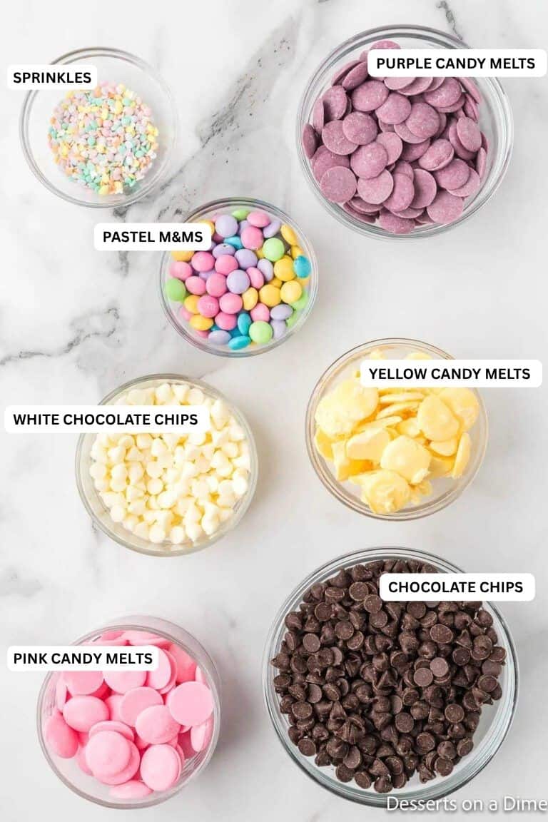 Ingredients for recipe: sprinkles, candy melts, pastel M&Ms and chocolate chips. 