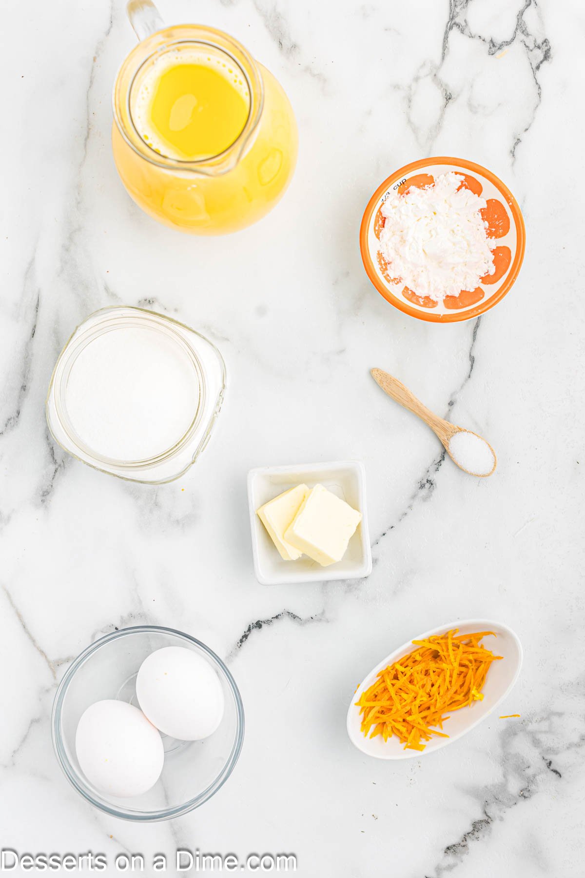 Ingredients for Orange Pudding - cornstarch, orange juice, orange zest, butter, eggs.