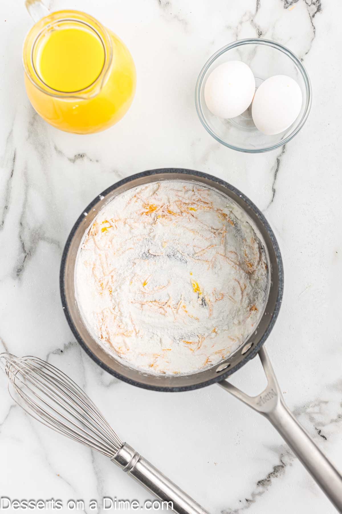 Saucepan with sugar, cornstarch, salt and orange zest.