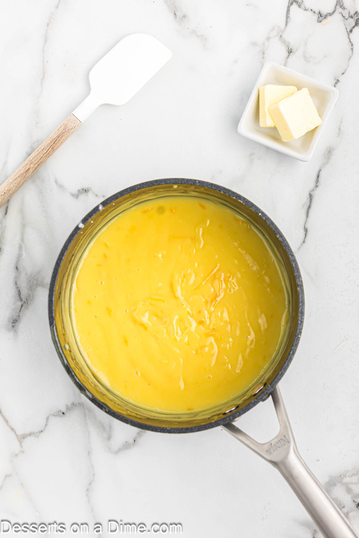 Egg mixture added to saucepan.
