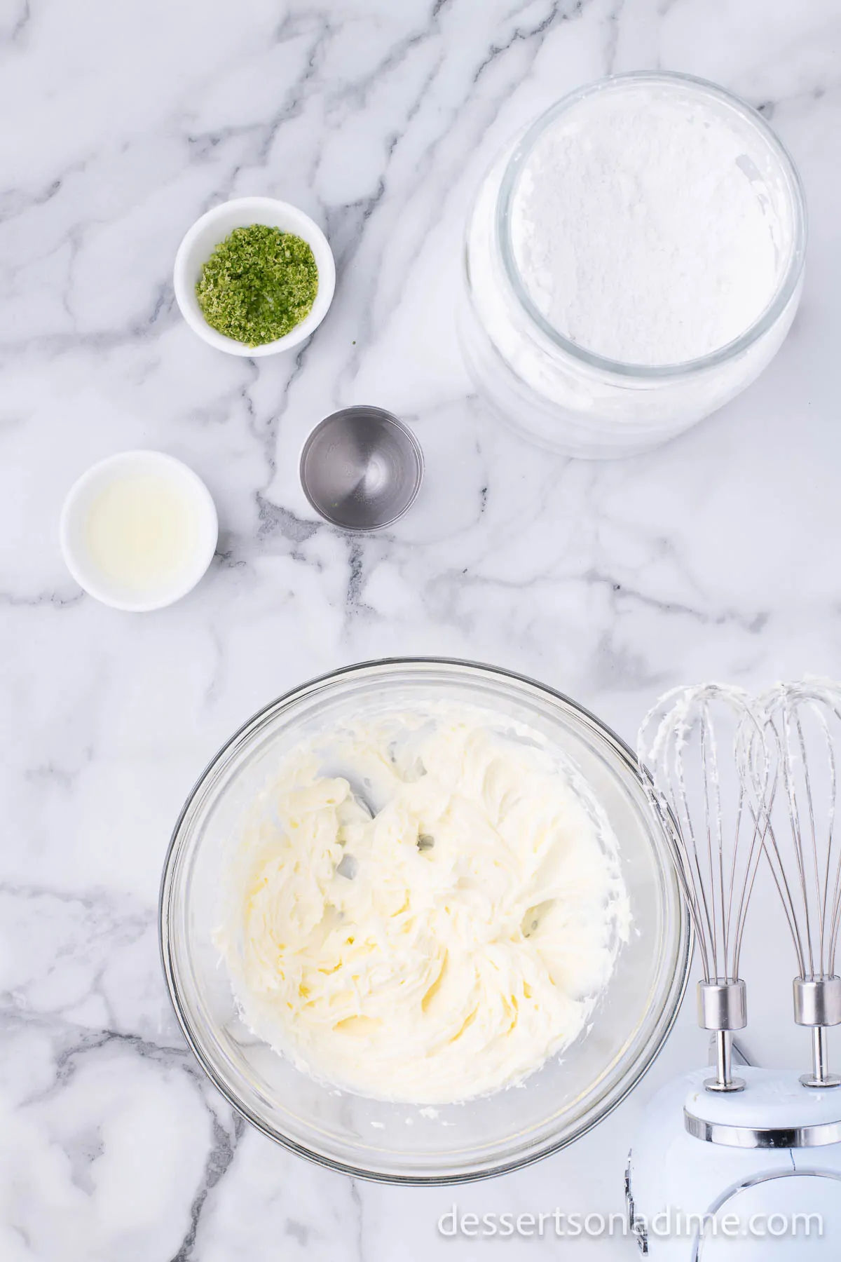 Frosting ingredients combined in bowl.