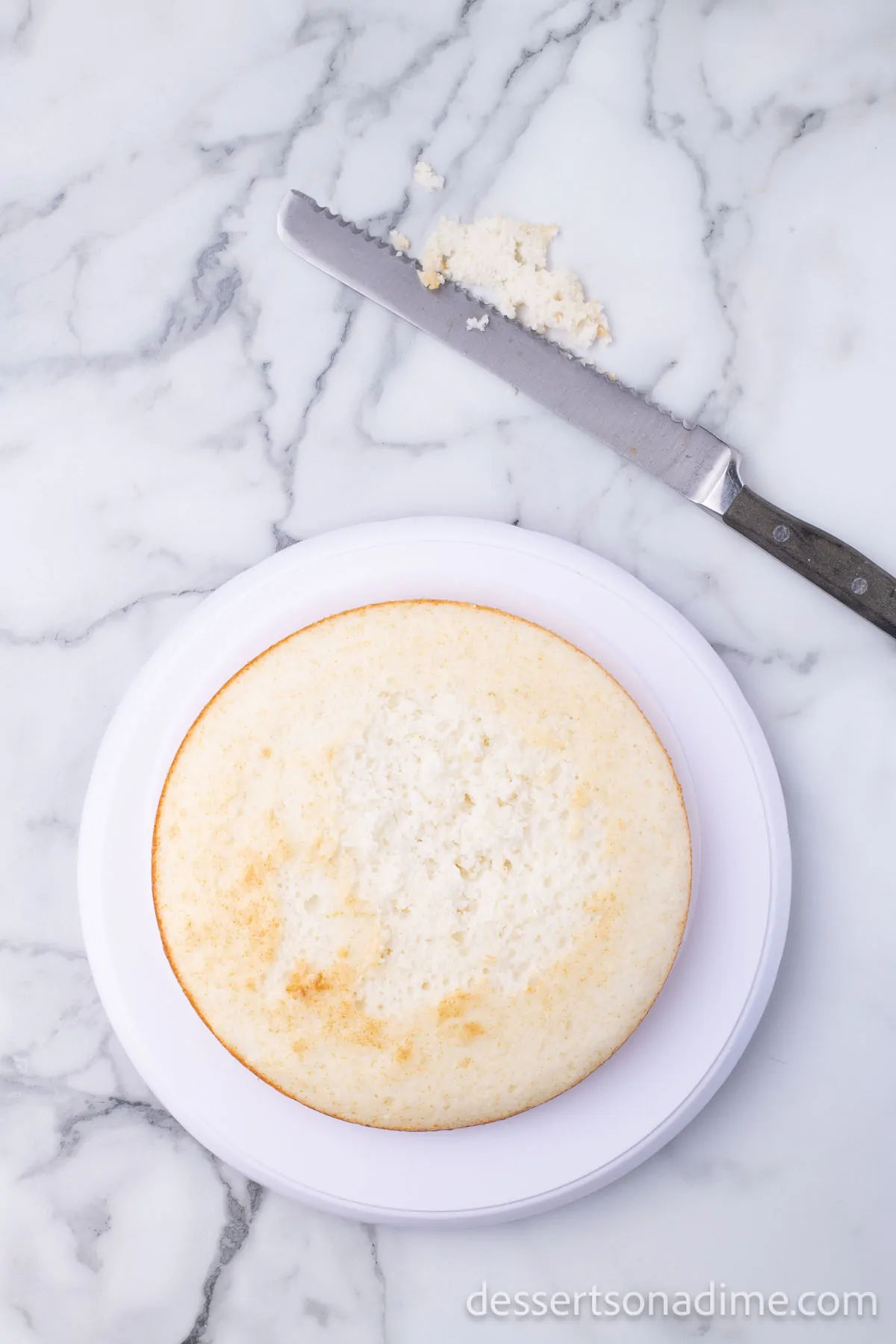 Cake leveled with knife.