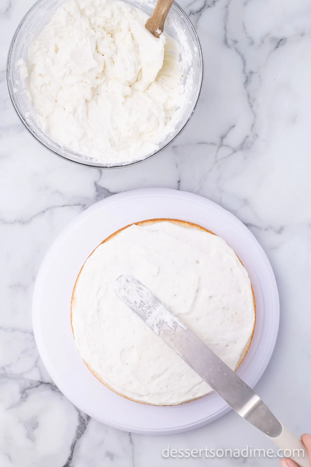 Frosting spread on cake.